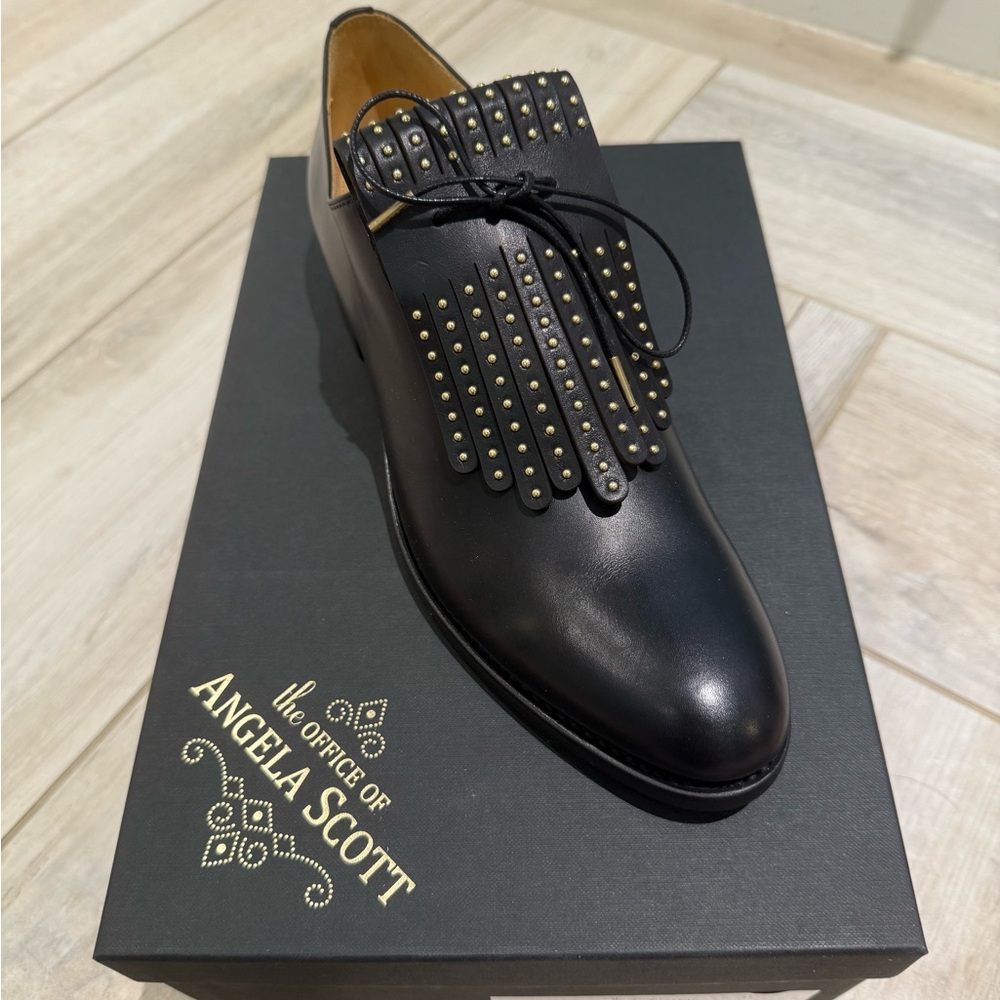 Black Studded Leather Flats with Edgy Design